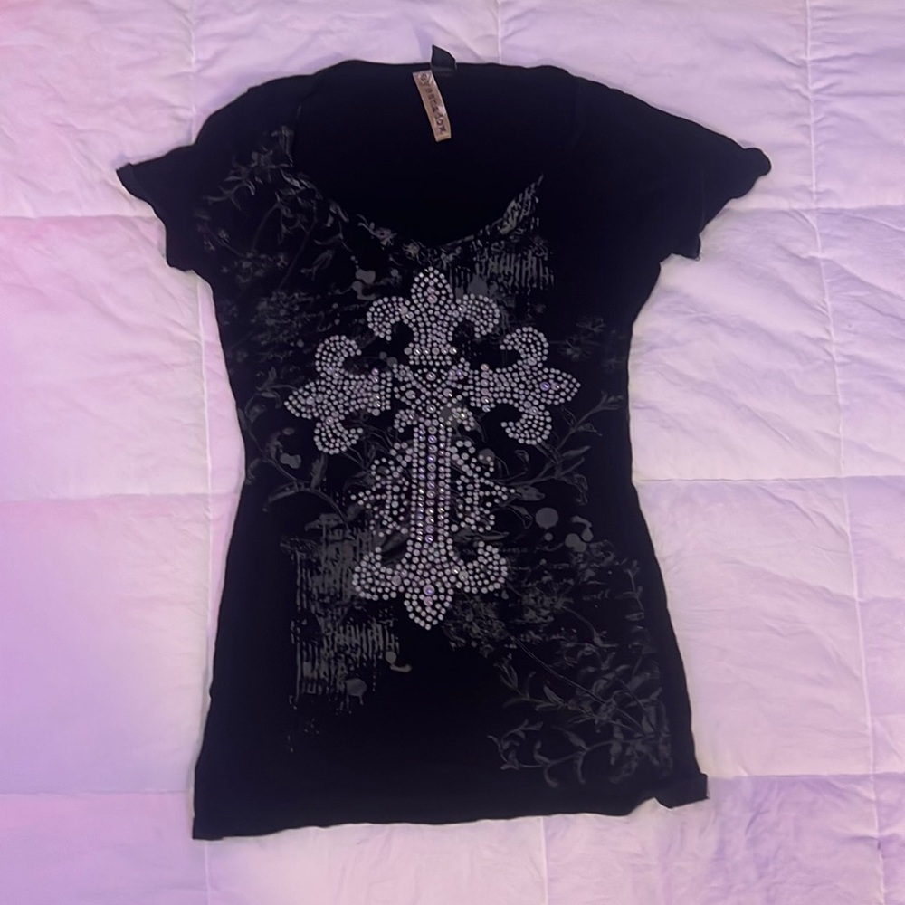black eyeshadow top, with floral background, glitter stones on front